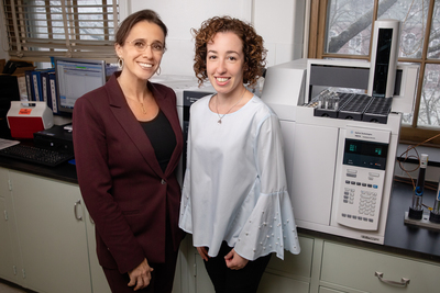 Photo of food science and human nutrition professor M. Yanina Pepino and postdoctoral research associate Maria Belen Acevedo standing in their lab