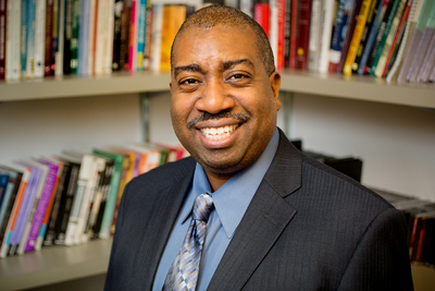Travis Dixon is a professor of communication at Illinois whose research deals with stereotypes in the mass media and their impact.