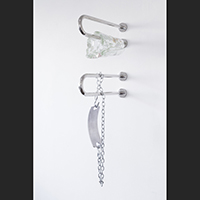 Image of a large medical ID bracelet hanging from a bracket.