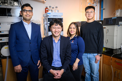 Illinois researchers professor Diwakar Shukla, left, professor Xiao Su, Anaira Román Santiago and Song Yin standing in Su's laboratory at the RAL building at U. of I.